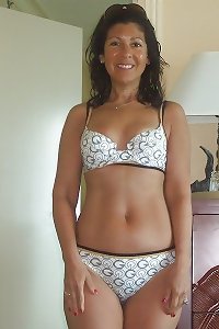 curvy lush nymph unclothing and posing suggestively